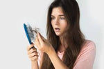 How do I reduce hair loss problems naturally?